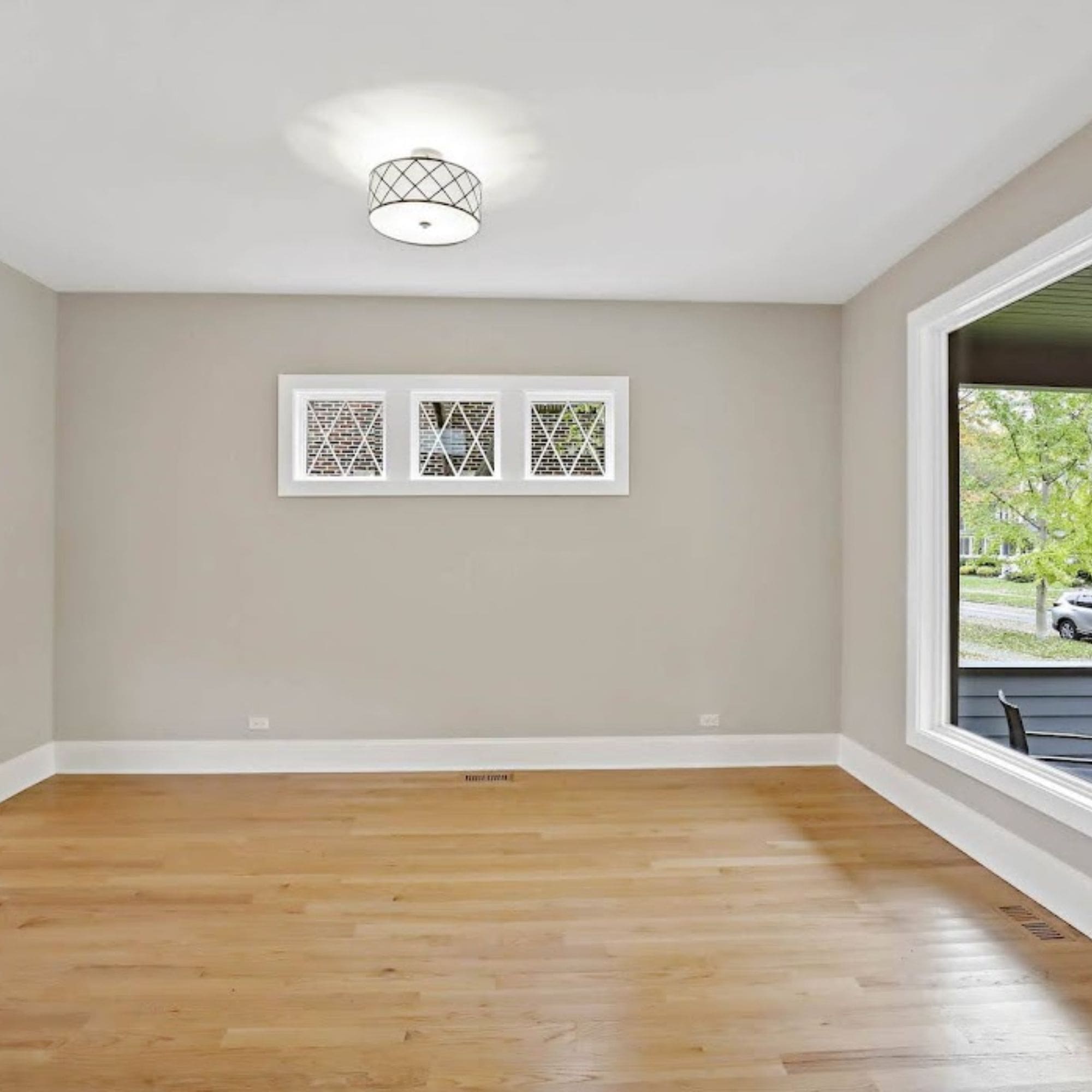 A vacant living area before the home staging process begins