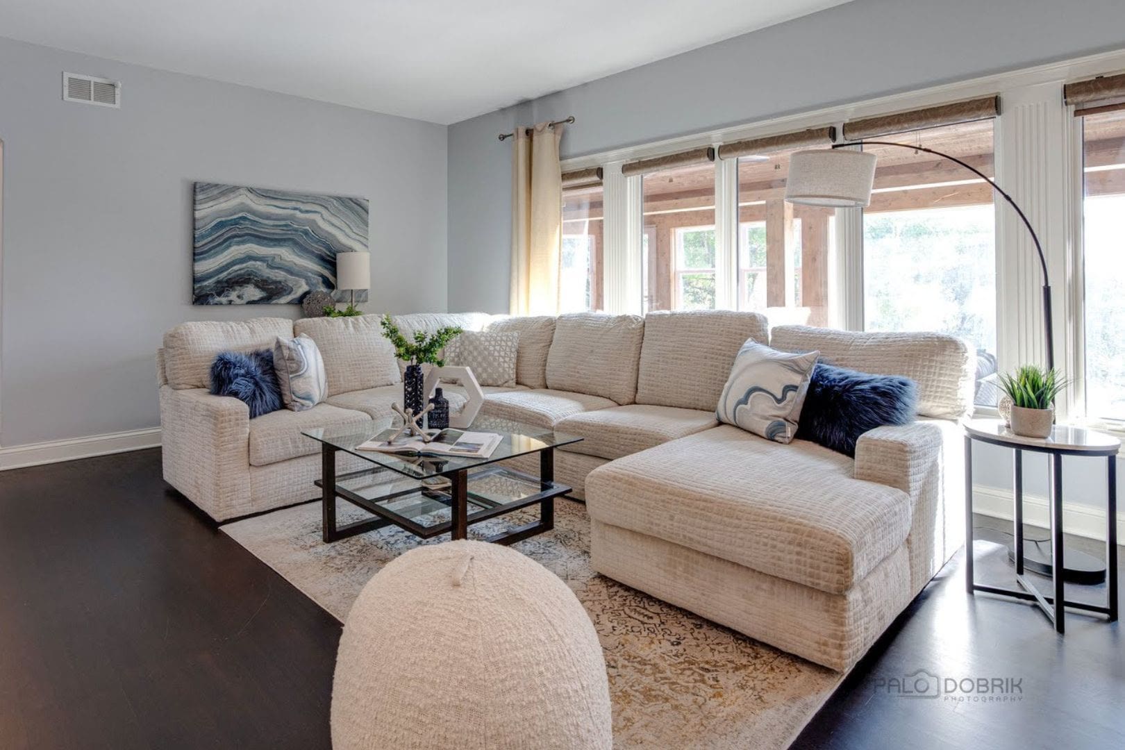 unnamed (1) A comfortable staged living room adorned with a fireplace and cozy seating arrangements.