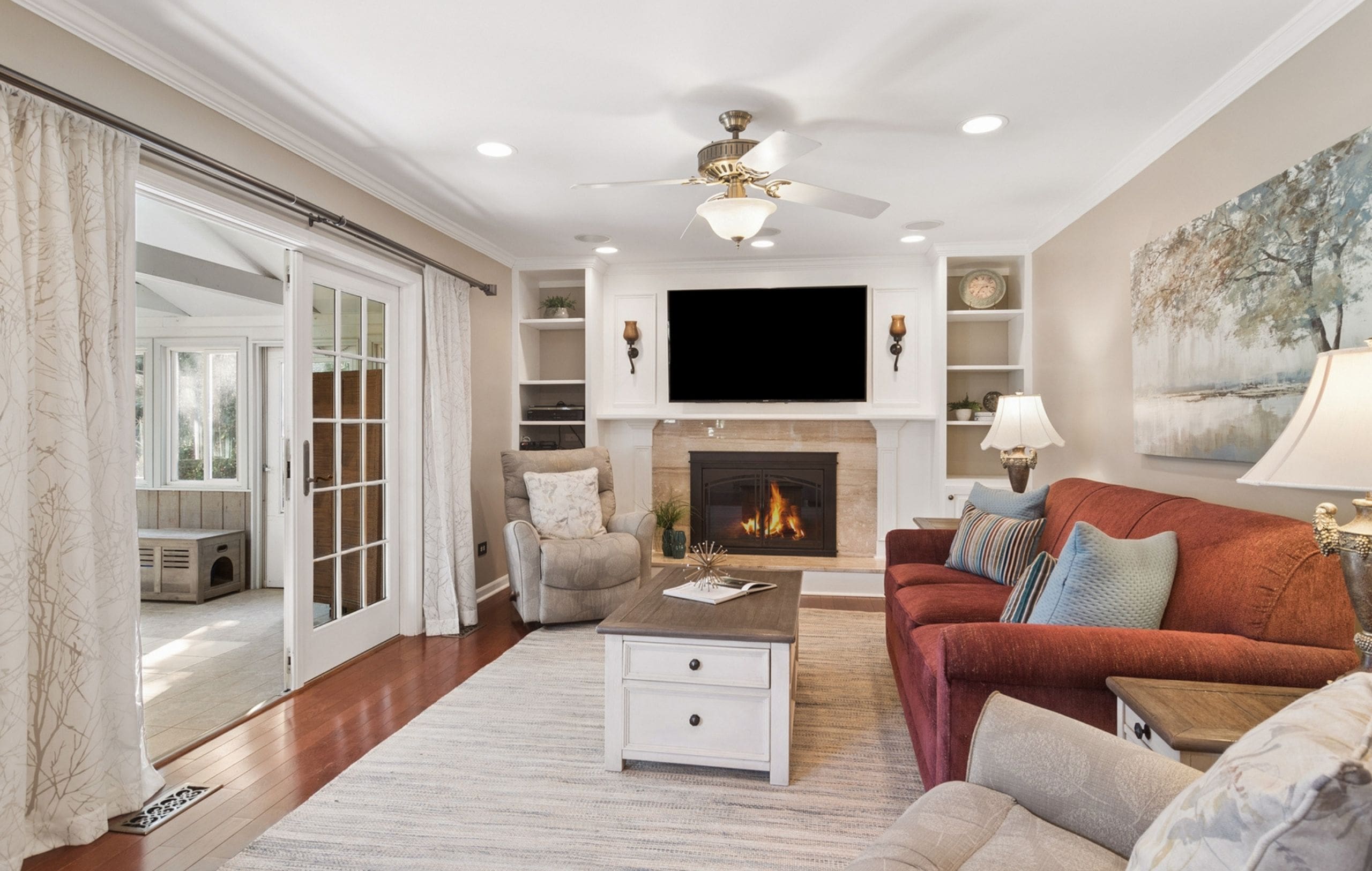 Barrington1 A beautifully staged living room with a cozy sofa and elegant decor.